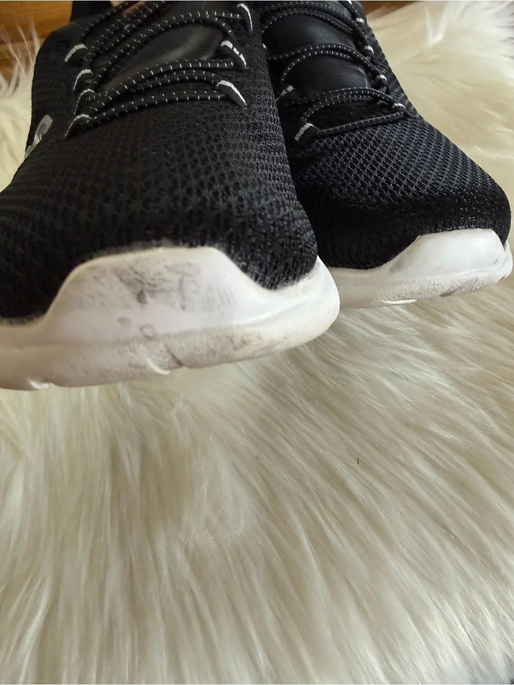 Skechers Women's Black Knit Slip-On Athletic Sneakers with White Sole